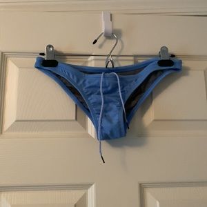 Jolyn Europe swim suit tie front bottom size L in light blue